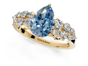 Cluster Engagement Ring Setting for Fancy Blue Pear-Shaped Center with 2-Row Shoulder Clusters and Prong Head in Yellow Gold
