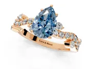Solitaire Engagement Ring Setting for Fancy Blue Pear-Shaped Center with Bar-Station Pave Twist and Prong Head in Rose Gold