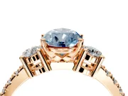 3 Stone Engagement Ring Setting for Fancy Blue Pear-Shaped Center with Round Cut Side Accents and Prong Head in Rose Gold