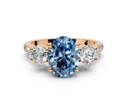 3 Stone Engagement Ring Setting for Fancy Blue Oval Center with Crossover Basket, Pave Band and Prong Head in Rose Gold