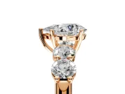 5 Stone Engagement Ring Setting for Pear-Shaped Center with Graduated Accents and Prong Head in Rose Gold