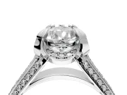 Solitaire Engagement Ring Setting for Pear-Shaped Center with Accented Split Shank and Prong Head in Platinum
