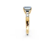 5 Stone Engagement Ring Setting for Fancy Blue Asscher Cut Center with Plain Band and Prong Head in Yellow Gold