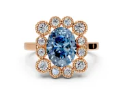 Cluster Halo Engagement Ring Setting for Fancy Blue Oval Center with Milgrain Bezel Accents and Prong Head in Rose Gold