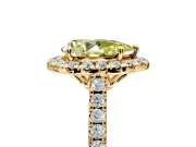 Halo Engagement Ring Setting for Fancy Yellow Pear-Shaped Center with Raised Halo, Pave Band and Prong Head in Yellow Gold