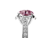 Floral Engagement Ring Setting for Fancy Pink Round Cut Center with Four Accent Clusters and Prong Head in Platinum