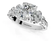 Cluster Engagement Ring Setting for Radiant Cut Center with Bezel Accent Clusters and Prong Head in Sterling Silver