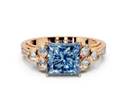 Cluster Engagement Ring Setting for Fancy Blue Princess Cut Center with Bezel Accent Clusters and Prong Head in Rose Gold
