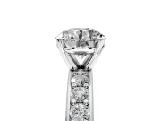 Solitaire Engagement Ring Setting for Round Cut Center with Channel-Set Accents and Prong Head in White Gold