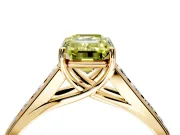Solitaire Engagement Ring Setting for Fancy Yellow Emerald Cut Center with Round Cut Channel Band and Prong Head in Yellow Gold