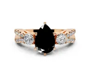 3 Stone Engagement Ring Setting for Fancy Black Pear-Shaped Center with Pave Split Shank and Prong Head in Rose Gold