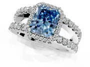 Halo Engagement Ring Setting for Fancy Blue Radiant Cut Center with Wide-Open Pave Split Shank and Prong Head in Platinum