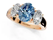 3 Stone Engagement Ring Setting for Fancy Blue Oval Center with Raised Basket Heads and Prong Head in Rose Gold