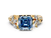 Floral Engagement Ring Setting for Fancy Blue Asscher Cut Center with Trailing Marquise Accents and Prong Head in Yellow Gold