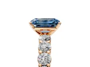 Shared-Prong Engagement Ring Setting for Fancy Blue Emerald Cut Center with Graduated Accents and Prong Head in Rose Gold