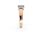 3 Stone Engagement Ring Setting for Fancy Blue Emerald Cut Center with Raised Basket Heads and Prong Head in Rose Gold