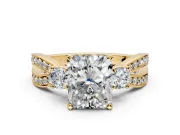 3 Stone Engagement Ring Setting for Radiant Cut Center with Pave Twist Band and Prong Head in Yellow Gold