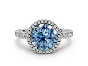Accent Halo Engagement Ring Setting for Fancy Blue Round Cut Center with Full-Length Pave Band and Prong Head in White Gold