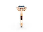 Starburst Halo Engagement Ring Setting for Fancy Blue Emerald Cut Center with Flat Cathedral Band and Prong Head in Rose Gold
