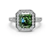 Bezel-Framed Halo Engagement Ring Setting for Fancy Green Radiant Cut Center with Pave Band and Prong Head in Platinum