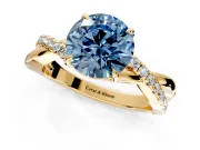 Crossover Engagement Ring Setting for Fancy Blue Round Cut Center with Pave and Plain Strands and Prong Head in Yellow Gold