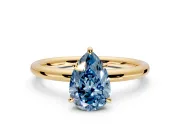 Low-Set Solitaire Engagement Ring Setting for Fancy Blue Pear-Shaped Center with Thin Plain Band and Prong Head in Yellow Gold