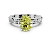 Solitaire Engagement Ring Setting for Fancy Yellow Oval Center with Channel-Set Accents and Prong Head in Platinum