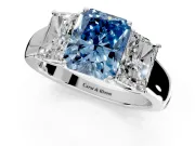 3 Stone Engagement Ring Setting for Fancy Blue Radiant Cut Center with Raised Basket Heads and Prong Head in Platinum