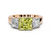 3 Stone Engagement Ring Setting for Fancy Yellow Princess Cut Center with Raised Basket Heads and Prong Head in Rose Gold
