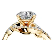 Solitaire Engagement Ring Setting for Round Cut Center with Pave Bypass Twist Band and Prong Head in Yellow Gold
