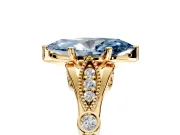 Solitaire Engagement Ring Setting for Fancy Blue Marquise Center with Marquise and Bezel Accents and Prong Head in Yellow Gold