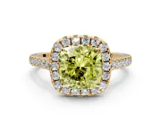 Halo Engagement Ring Setting for Fancy Yellow Cushion Cut Center with Narrowing Pave Band and Prong Head in Yellow Gold