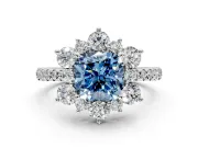 Floral Halo Engagement Ring Setting for Fancy Blue Cushion Cut Center with Pave Accents and Prong Head in White Gold