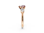 3 Stone Engagement Ring Setting for Fancy Pink Heart-Shaped Center with Large Pear-Shaped Accents and Prong Head in Rose Gold