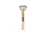 Solitaire Engagement Ring Setting for Fancy Blue Radiant Cut Center with Trailing Leaf Accent Band and Prong Head in Yellow Gold