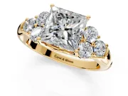 Cluster Engagement Ring Setting for Princess Cut Center with Round Cut Accent Frame and Prong Head in Yellow Gold