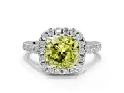 Halo Engagement Ring Setting for Fancy Yellow Cushion Cut Center with Narrowing Pave Band and Prong Head in Platinum
