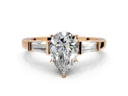 3 Stone Engagement Ring Setting for Pear-Shaped Center with Channel Baguette Accents and Prong Head in Rose Gold
