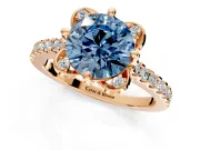 Floral Engagement Ring Setting for Fancy Blue Round Cut Center with Pave Band and Floral Prong Head in Rose Gold