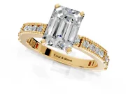 Solitaire Engagement Ring Setting for Emerald Cut Center with Milgrain-Edged Pave Band and Prong Head in Yellow Gold