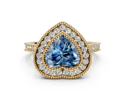 Halo Engagement Ring Setting for Fancy Blue Heart-Shaped Center with Milgrain Frame, Pave Band and Prong Head in Yellow Gold
