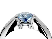 Tension Engagement Ring Setting for Fancy Blue Pear-Shaped Center with Wide Tapered Band and Tension Head in Platinum