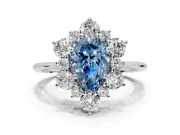 Small-Accent Cluster Halo Engagement Ring Setting for Fancy Blue Pear-Shaped Center with Plain Band and Prong Head in Sterling Silver