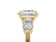 3 Stone Engagement Ring Setting for Princess Cut Center with Large Pear-Shaped Accents and Prong Head in Yellow Gold