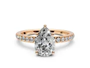 Solitaire Engagement Ring Setting for Pear-Shaped Center with Fine Pave Band and Prong Head in Rose Gold
