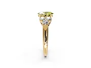 Cluster Engagement Ring Setting for Fancy Yellow Oval Center with Round Cut Accent Frame and Prong Head in Yellow Gold