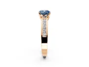 Solitaire Engagement Ring Setting for Fancy Blue Cushion Cut Center with Princess Cut Channel Band and Prong Head in Rose Gold