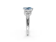 Cluster Engagement Ring Setting for Fancy Blue Pear-Shaped Center with Round Cut Accent Frame and Prong Head in Sterling Silver