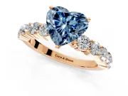 Shared-Prong Engagement Ring Setting for Fancy Blue Heart-Shaped Center with Graduated Accents and Prong Head in Rose Gold