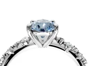 Solitaire Engagement Ring Setting for Fancy Blue Pear-Shaped Center with Trailing Leaf Accent Band and Prong Head in Platinum